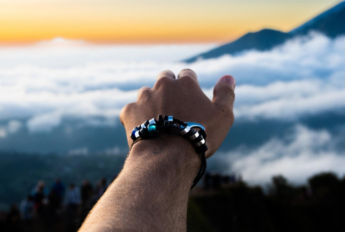 Photo of El Camino Bracelet worn in front of Mount Batur, in Bali.