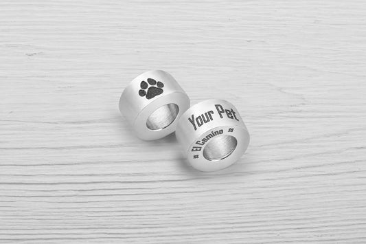 El Camino Bracelets Custom Paw Step is an engraved charm with your pet's name.
