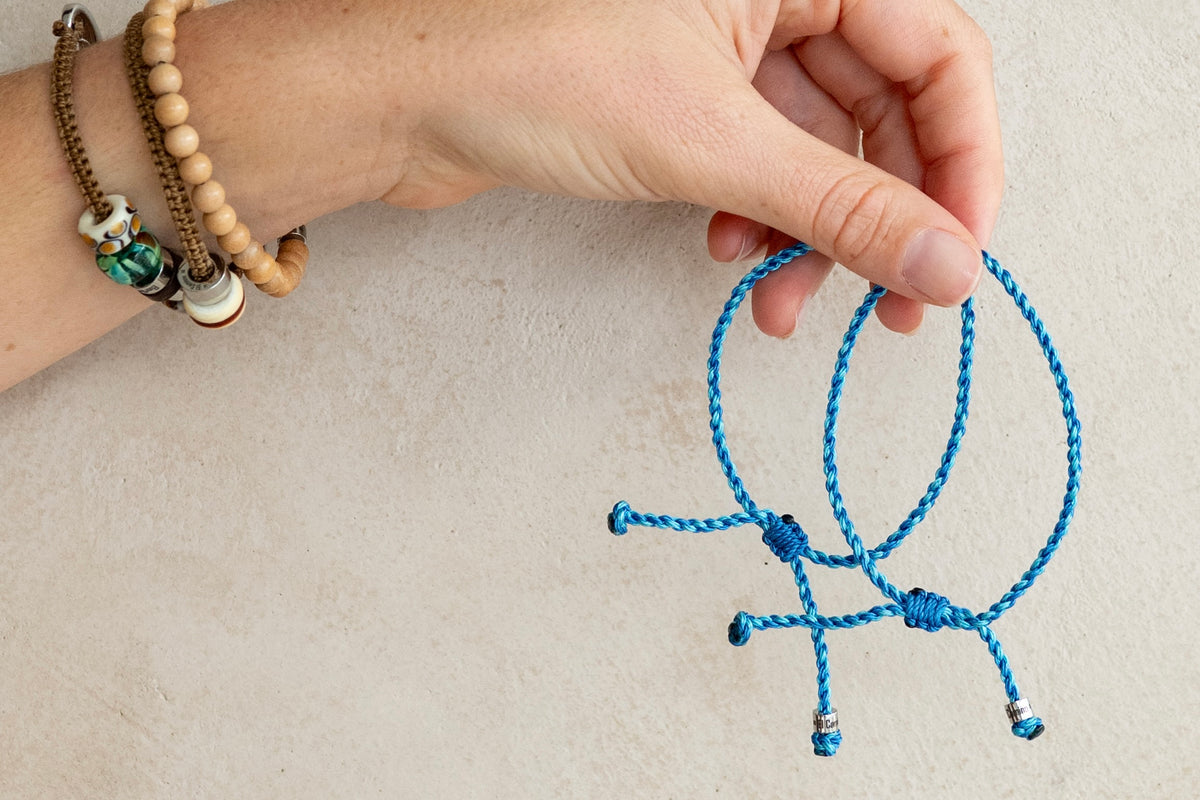 Two Turquoise and Blue Lagoon El Camino Journey Bracelets. The perfect friendship bracelet to gift to your travel partner. Worn alongside an El Camino Travel Bracelet.