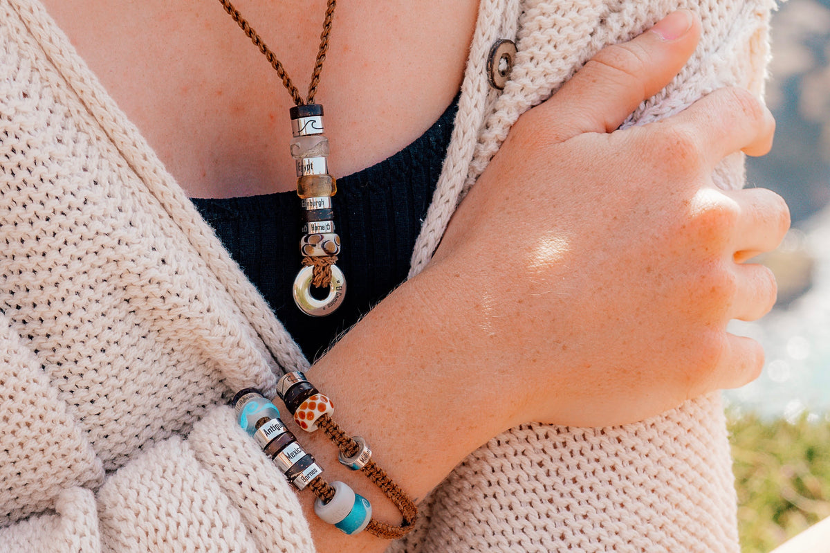 El Camino Brown Bracelet and Necklace with Waves, Baltic Sea, Egypt, Middle East, Edinburgh, Home, Leopard, Mediterranean, Antigua and Barbuda, Mexico, Borneo, Pacific Ocean, Giraffe and Elephant charms Steps travel memory beads
