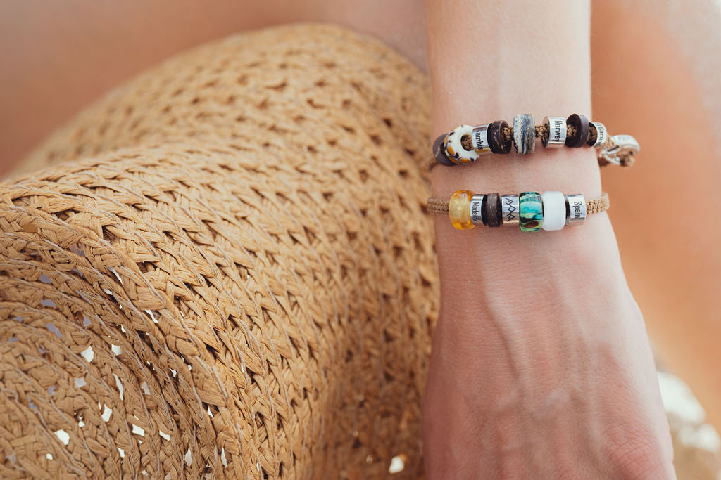 El Camino Brown travel bracelet with Leopard, Gambia, Rock, Norway, Middle East, Madeira, Mountain, Jungle and Spain charms Steps travel memory beads