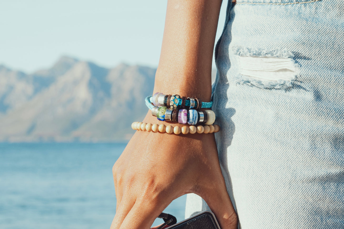El Camino Turquoise Bracelet with Arctic Ocean, Turtle, Earth, Pink Northern Lights, Cloud and Sand charms Steps travel memory beads.