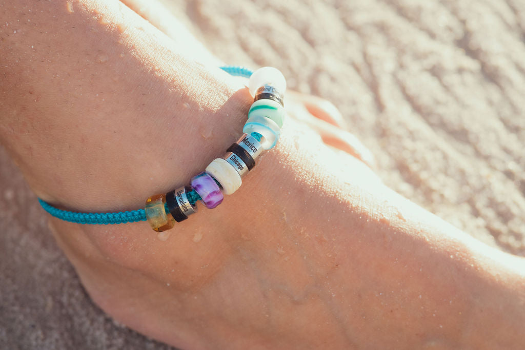 El Camino Blue Lagoon Anklet with Mexico, Chicago, Barcelona and Pink Northern Lights charms Steps memory beads